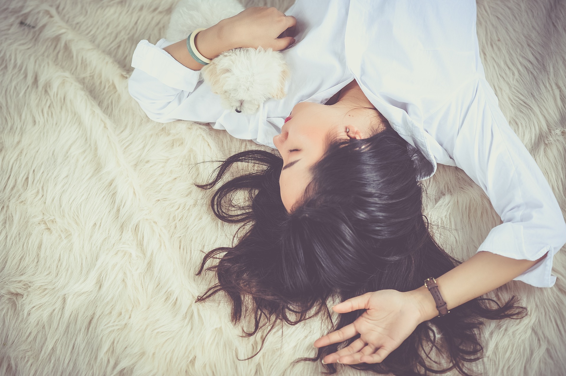 A woman asleep on a bed