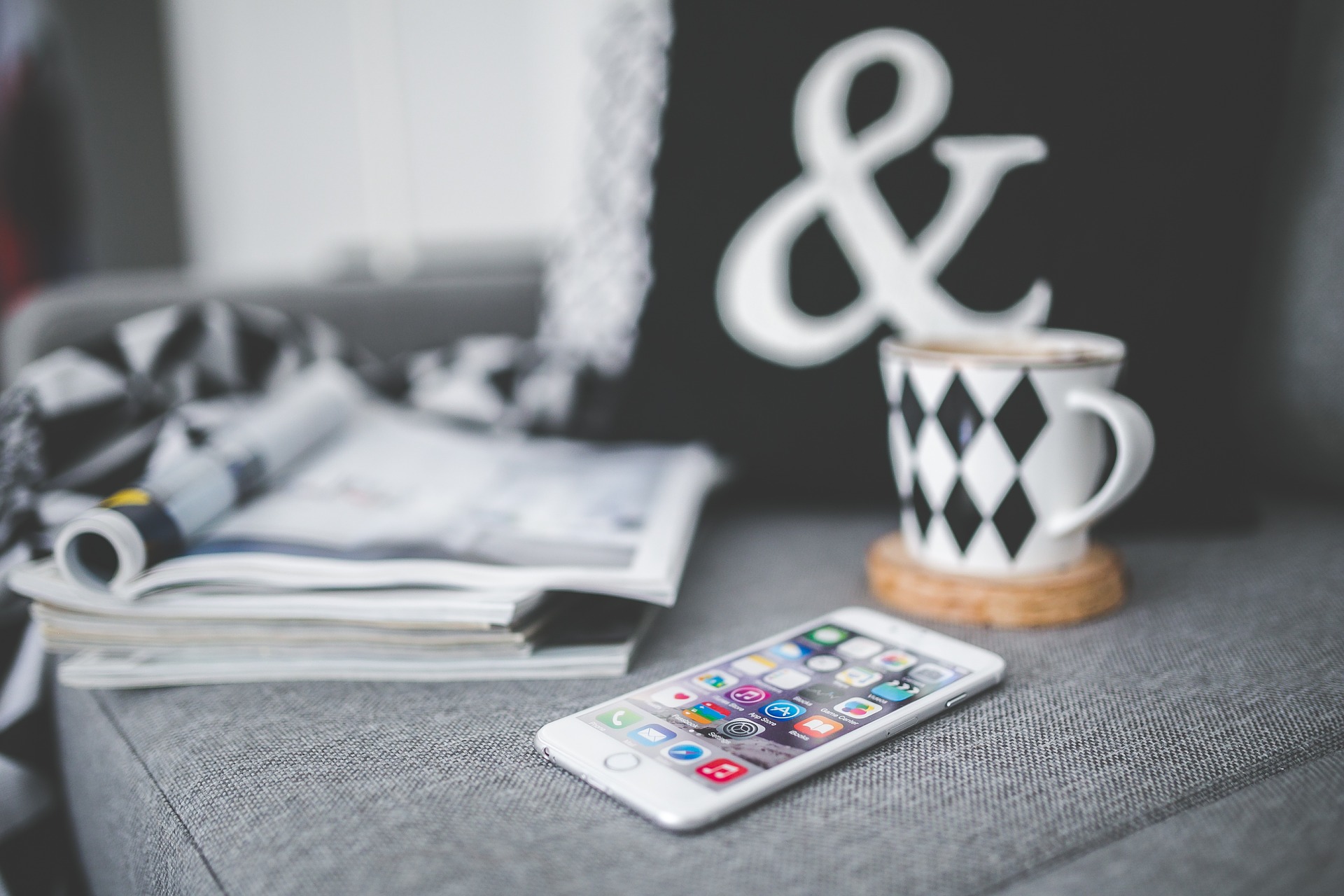 A mobile phone on a sofa