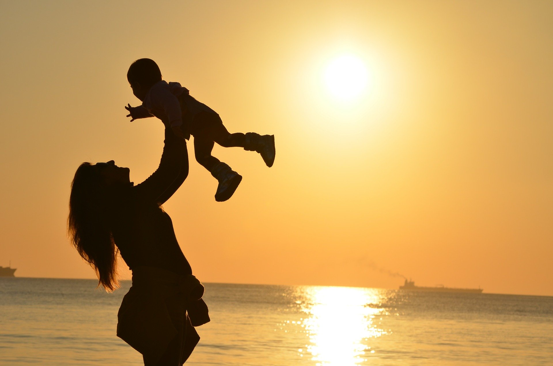 5 Things That Surprised Me About Becoming A Mum A woman holding a baby