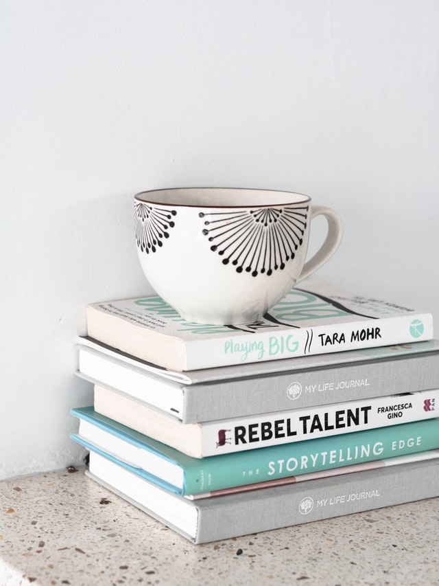 Books and a coffee mug